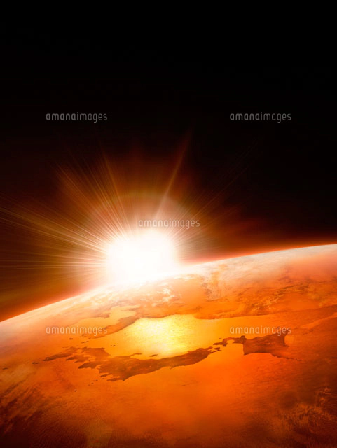 太陽とオレンジの地球イメージ5[02237008142]の写真・イラスト素材