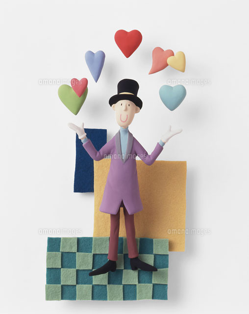 ハートを浮かばせるマジシャン の写真素材 イラスト素材 アマナイメージズ
