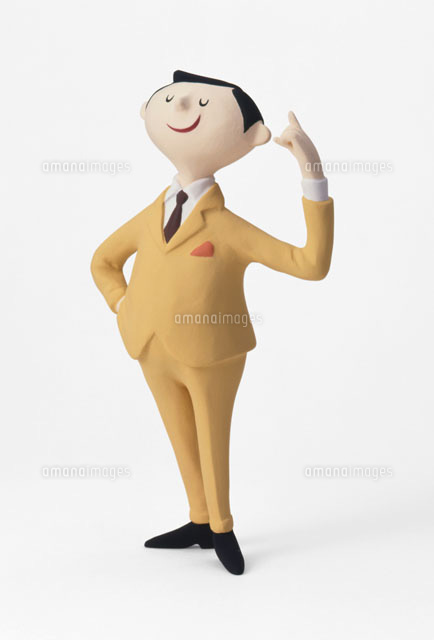 人差し指を立てるスーツの男 の写真素材 イラスト素材 アマナイメージズ