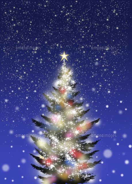 色々な色に光るクリスマスツリーとソリに乗ったサンタクロース