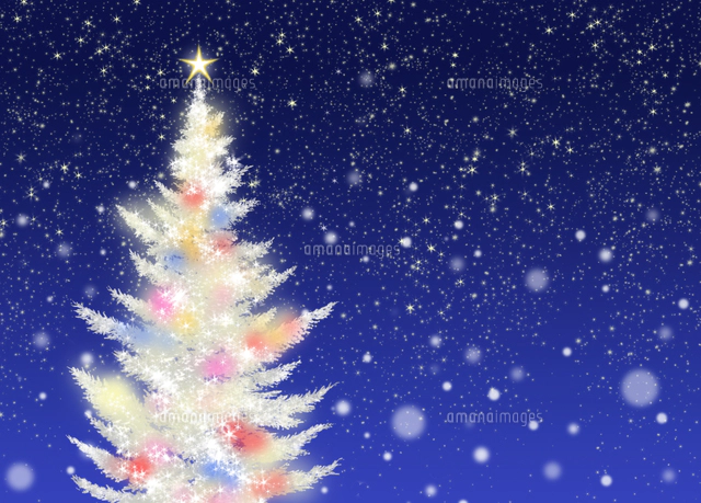 色々な色に光る白いクリスマスツリーとソリに乗るサンタクロース