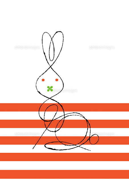 四葉のクローバーをくわえたうさぎ a の写真素材 イラスト素材 アマナイメージズ