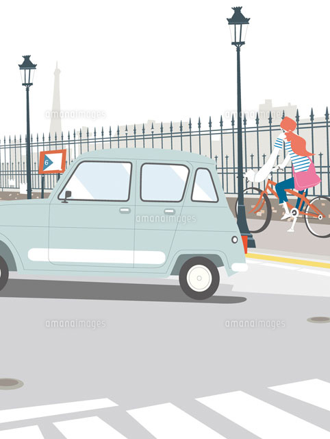 車と自転車に乗る女性 の写真素材 イラスト素材 アマナイメージズ