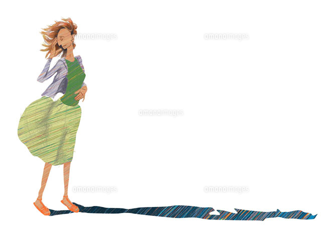風に吹かれている女性 の写真素材 イラスト素材 アマナイメージズ