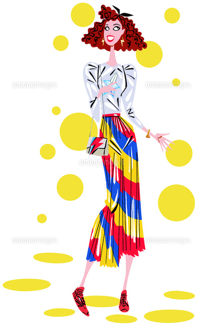 斜め縞のロングスカートを履いた女性 の写真素材 イラスト素材 アマナイメージズ