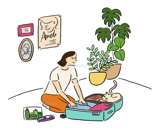 旅支度をしている女性 の写真素材 イラスト素材 アマナイメージズ