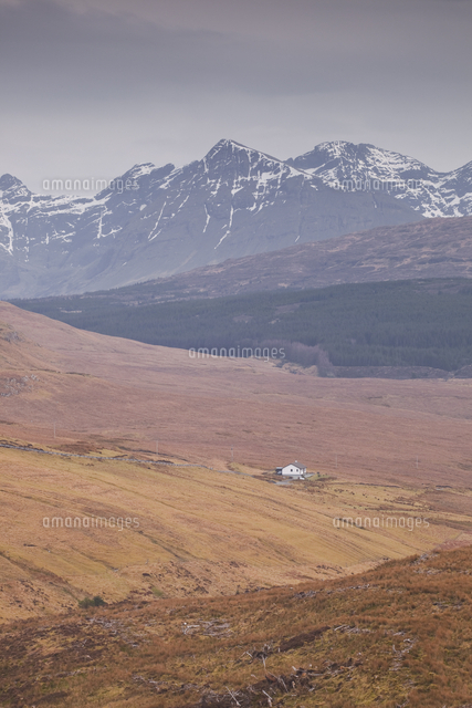 A lonely house sits in the shadow of the Cuillins on the Isle of Skye ...