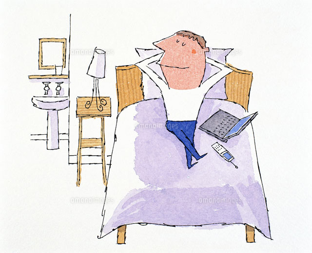 ベットでくつろぐ男性 の写真素材 イラスト素材 アマナイメージズ