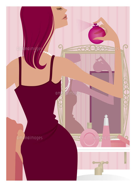 香水をふりかける女性 の写真素材 イラスト素材 アマナイメージズ