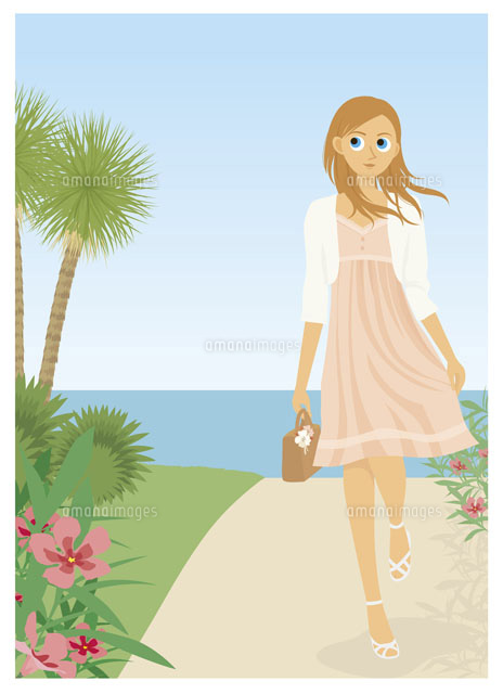 海の前を歩く女性 の写真素材 イラスト素材 アマナイメージズ