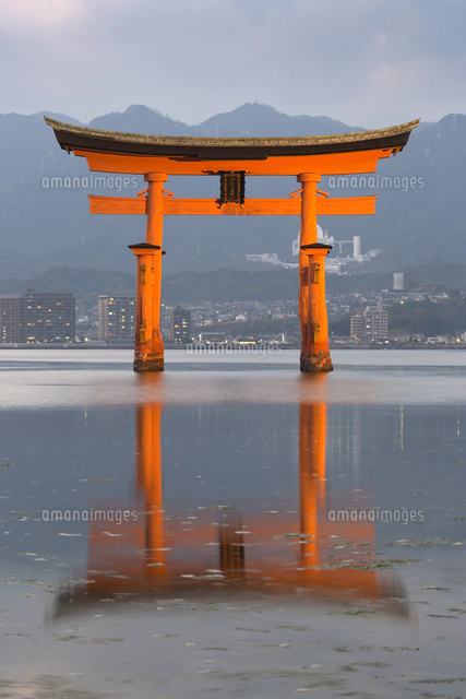 The floating Miyajima torii gate of Itsukushima Shrine at sunset
