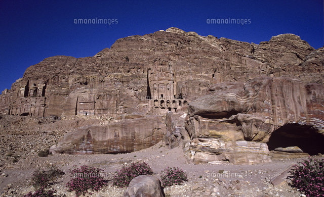 The Royal Tombs carved into the face of Jebel al-Khubtha in the ancient ...