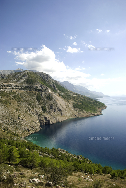 View Of Rocky Sea Coast Mountains And Blue Sky In Dalmatia Croatia view-of-rocky-sea-coast-mountains-and-blue-sky-in-dalmatia-croatia