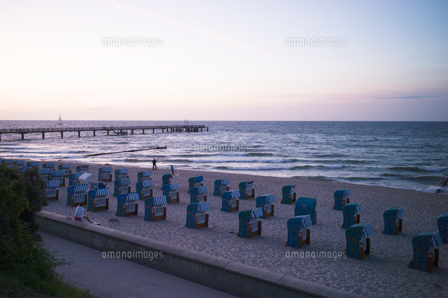 Beach chairs by dusk on the sandy beach in Kuhlungsborn, Rostock ...