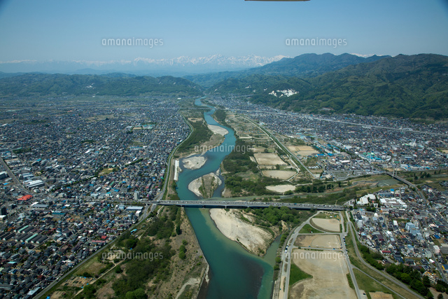 犀川緑地より犀川と川中島駅と街並み[25397013396]の写真・イラスト