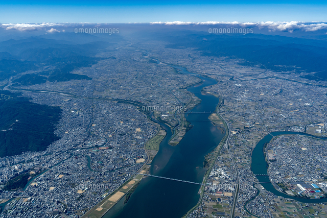 徳島市の街並みより徳島平野と吉野川[25397021969]の写真・イラスト