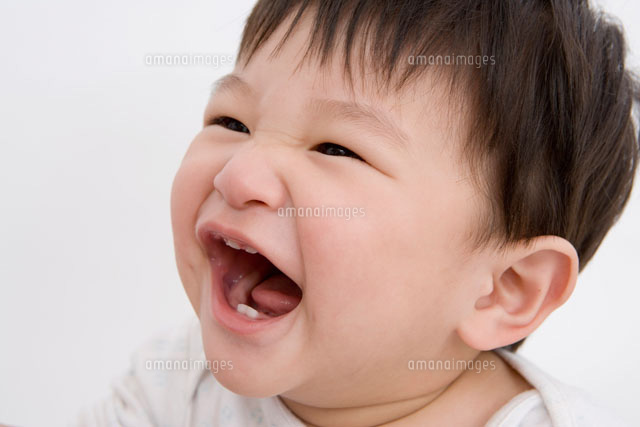 笑顔の男の赤ちゃんの顔 a の写真素材 イラスト素材 アマナイメージズ