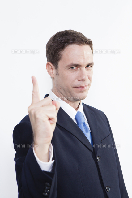 ナンバーワンのポーズをする外国人ビジネスマン の写真素材 イラスト素材 アマナイメージズ