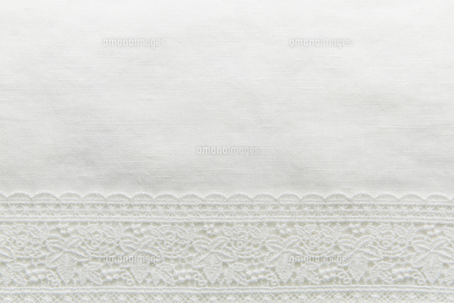 レースの付いた白い布 の写真素材 イラスト素材 アマナイメージズ