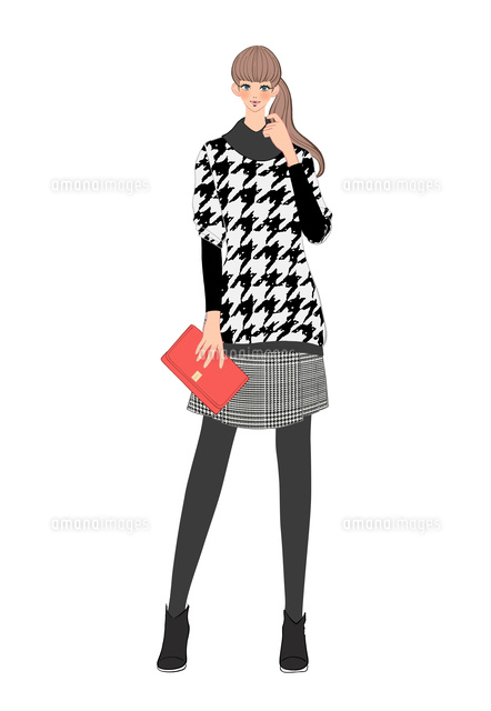 千鳥格子の服を着てハンドバッグを持って立つ女性 の写真素材 イラスト素材 アマナイメージズ