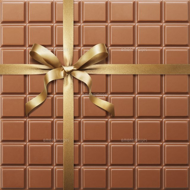 チョコレートとゴールドのリボン の写真素材 イラスト素材 アマナイメージズ