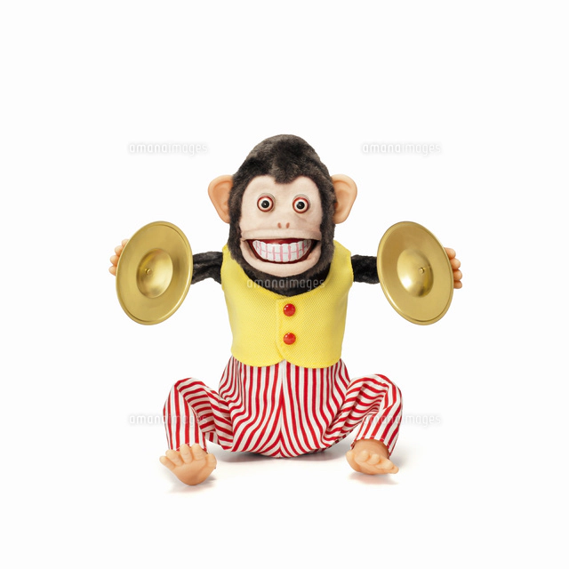 シンバルをたたくサルのおもちゃ[10610003154]の写真・イラスト素材