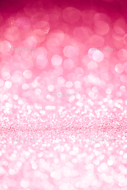 ピンクのキラキラグリッター背景 の写真素材 イラスト素材 アマナイメージズ