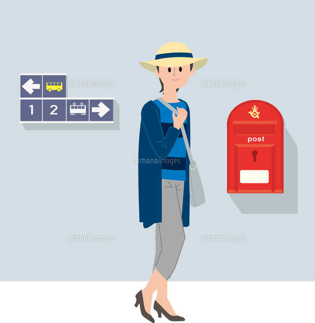 北欧の街角に立つ若い女性 の写真素材 イラスト素材 アマナイメージズ