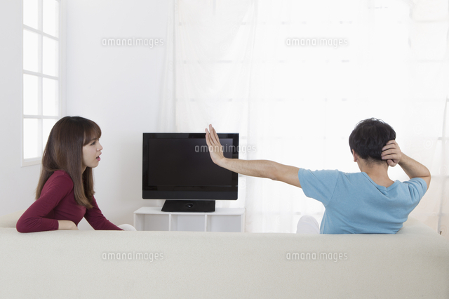 Young Asian couple sitting on the couch and having a fight,[11010053226 ...