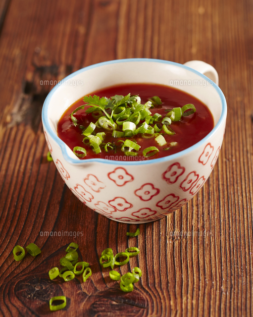 Sweet and sour fondue sauce with spring onions, ketchup, vinegar and