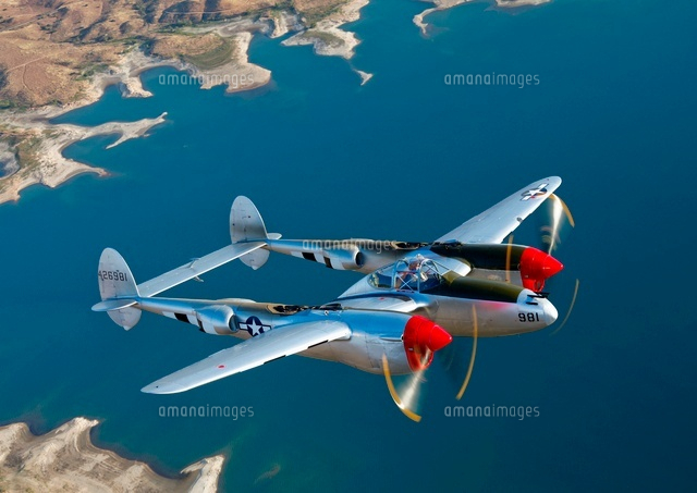 A Lockheed P-38 Lightning fighter aircraft in flight