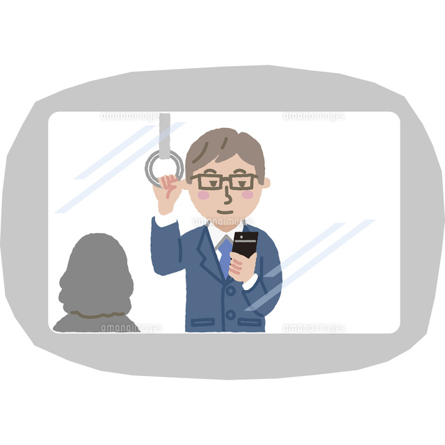 電車の中で携帯を見ているサラリーマン の写真素材 イラスト素材 アマナイメージズ