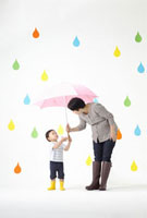 カラフルな雨のしずくバックにピンクの傘で相合傘をする母と子 の写真素材 イラスト素材 アマナイメージズ